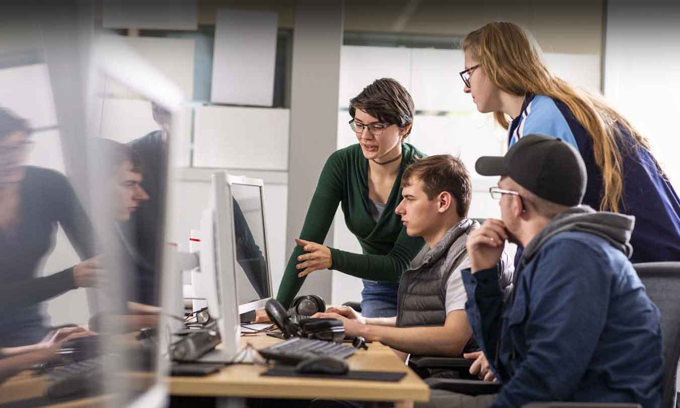 Group of students work on a project together